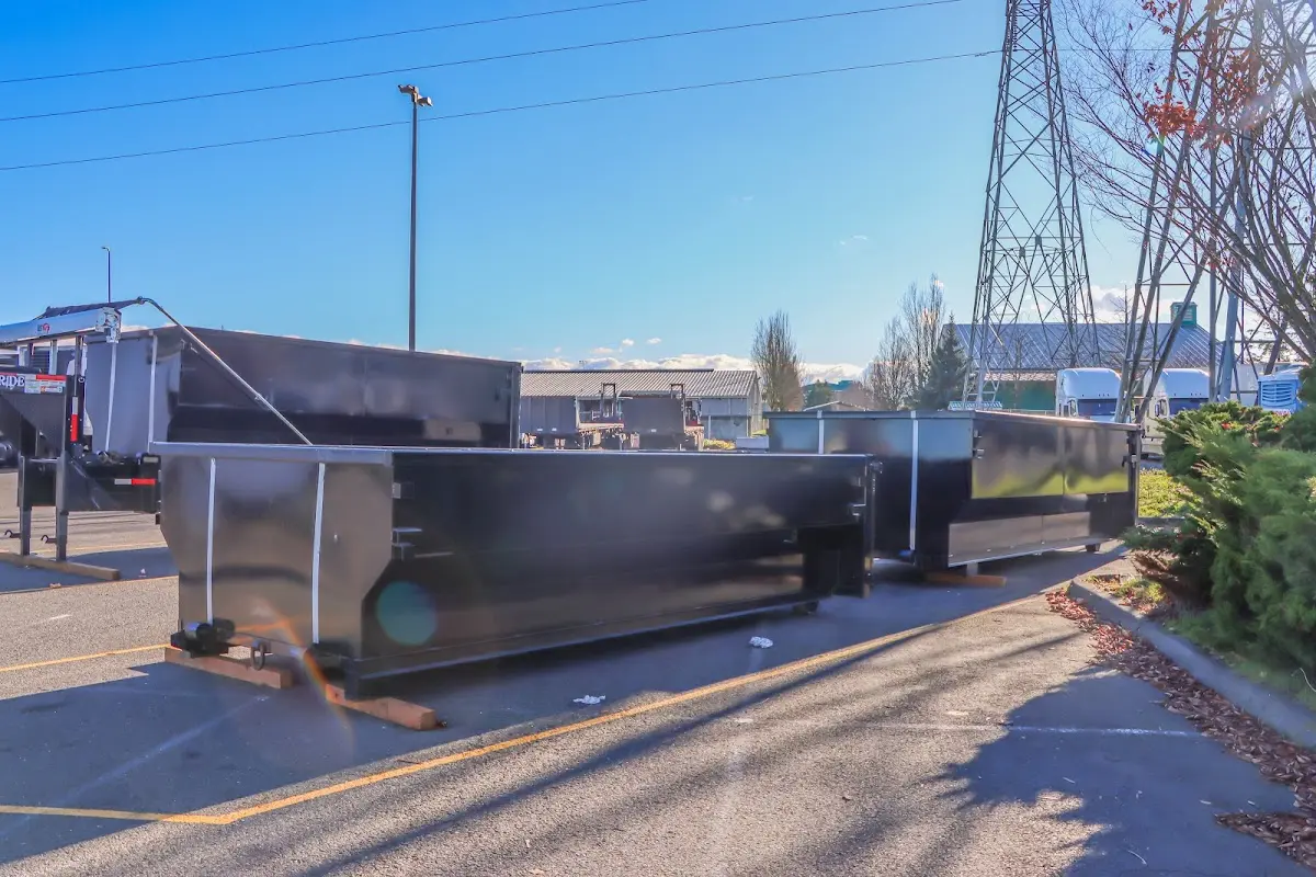 Roll-off dumpster ready for waste disposal at job site for Commercial Dumpster Rental in Burton